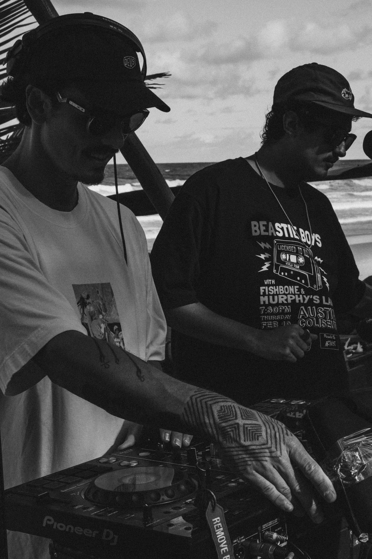 CALLORE duo behind the decks by the ocean